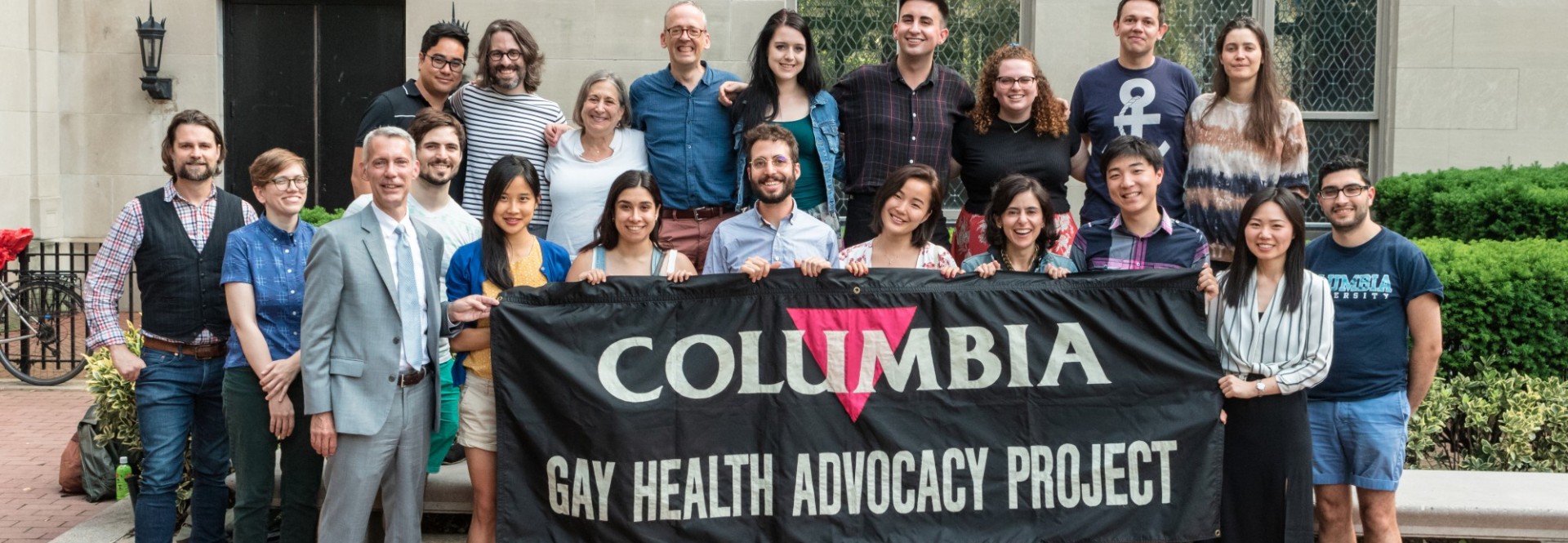 A photo of GHAP's co-founder Laura Pinsky, current GHAP Executive Director, Daniel Chiarilli and a number of GHAP advocates from throughout the program's history.