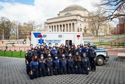 Photo of CUEMS team in front of ambulance on Morningside campus